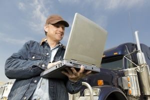 trucker on laptop